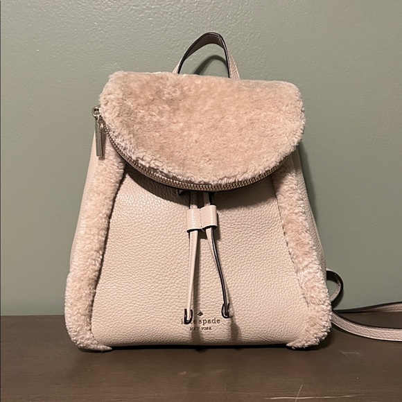 kate spade Handbags - Kate Spade Beige/Cream Shearling and Leather Backpack